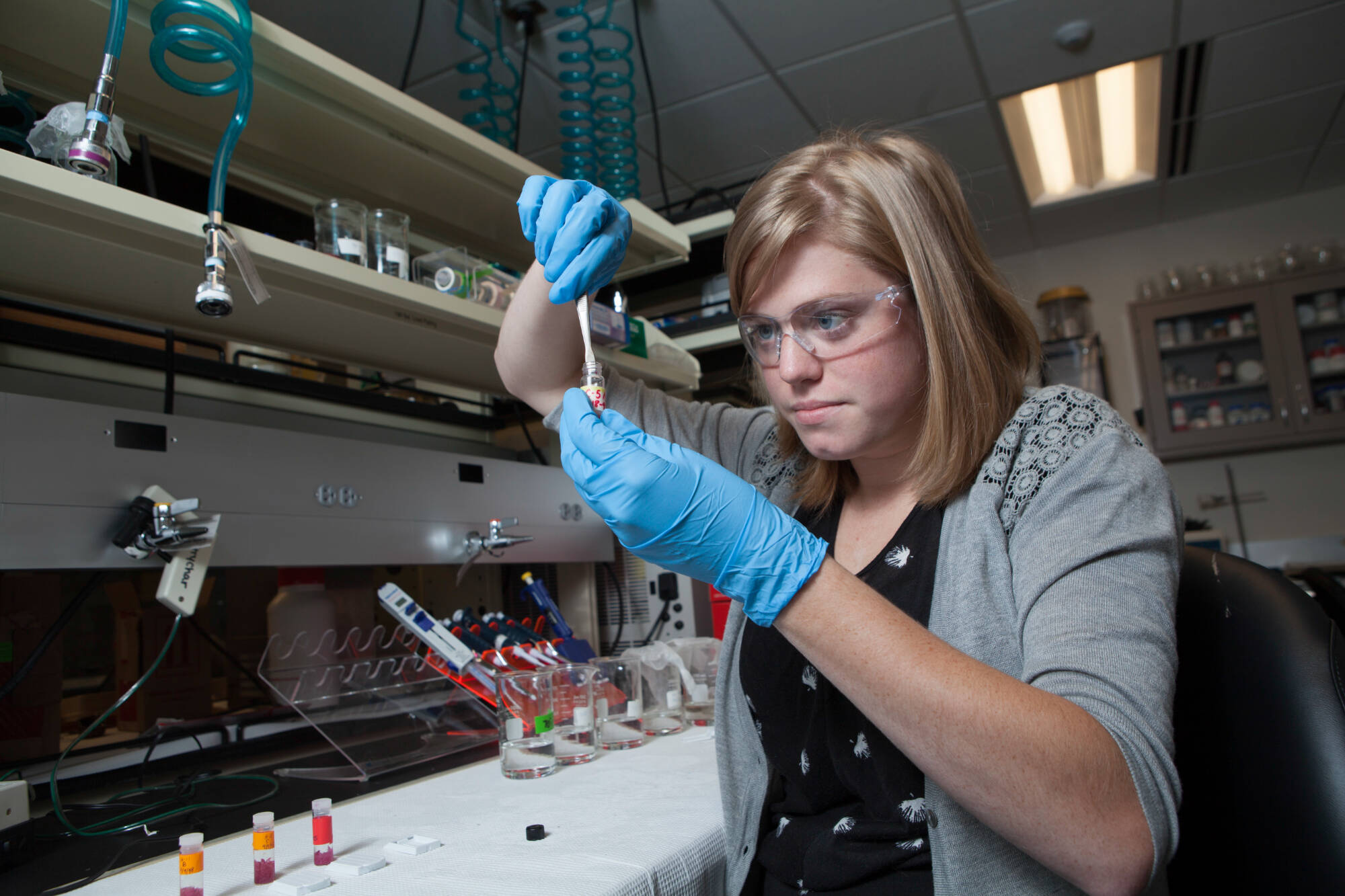 Undergraduate student Courtney Cave works in AWRI's Environmental Chemistry Lab.